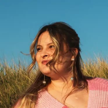 Model at photo shoot logo